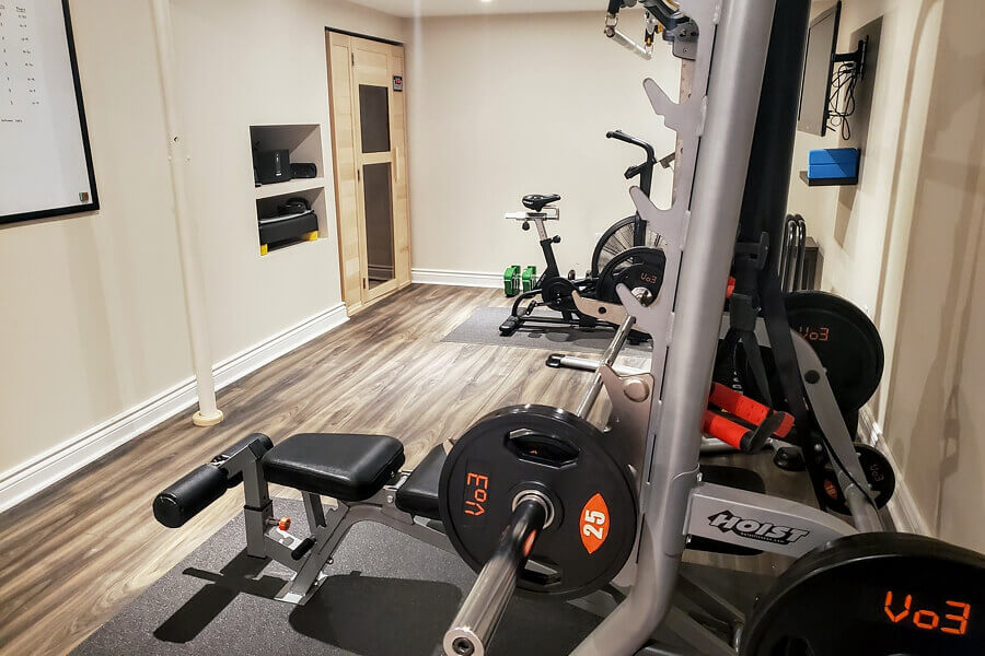 Lower level workout room with infrared sauna